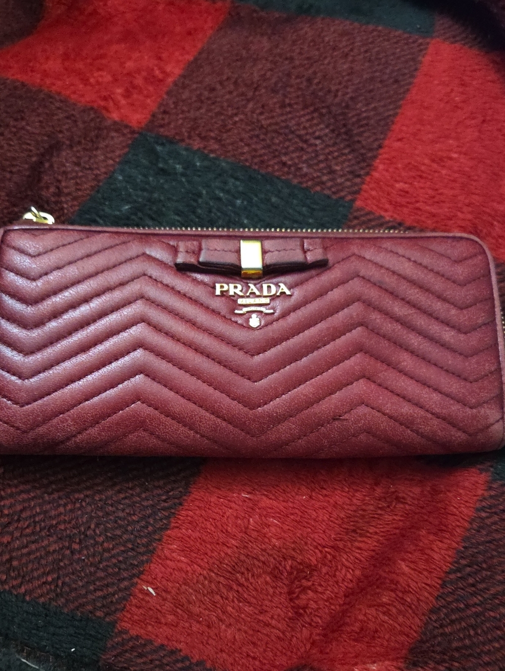 Prada Chevron Quilted Zip Wallet in Burgundy with Gold Hardware
